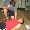 First aid performed on a man with a gunshot wound First aid performed on a man with a gunshot wound